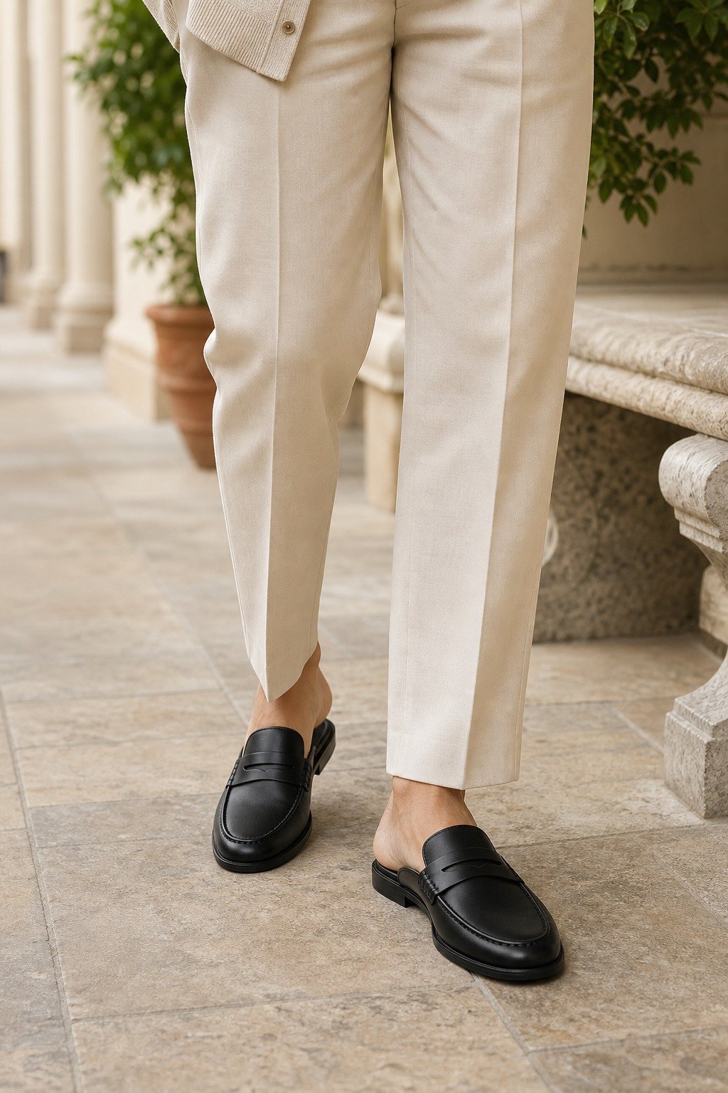 Ellermere Black Calf Backless Penny Loafer Mule styled with tailored trousers
