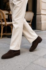 Hawkridge Dark Brown Suede Penny Loafer styled - lifestyle primary